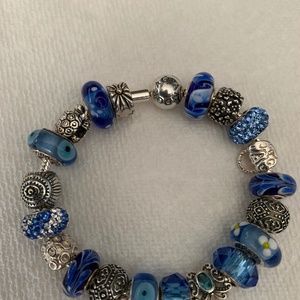 Authentic Pandora sterling silver bracelet with genuine sterling silver beads